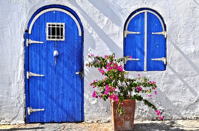 Blue Door Represents Entry Point When Starting Real Estate Business
